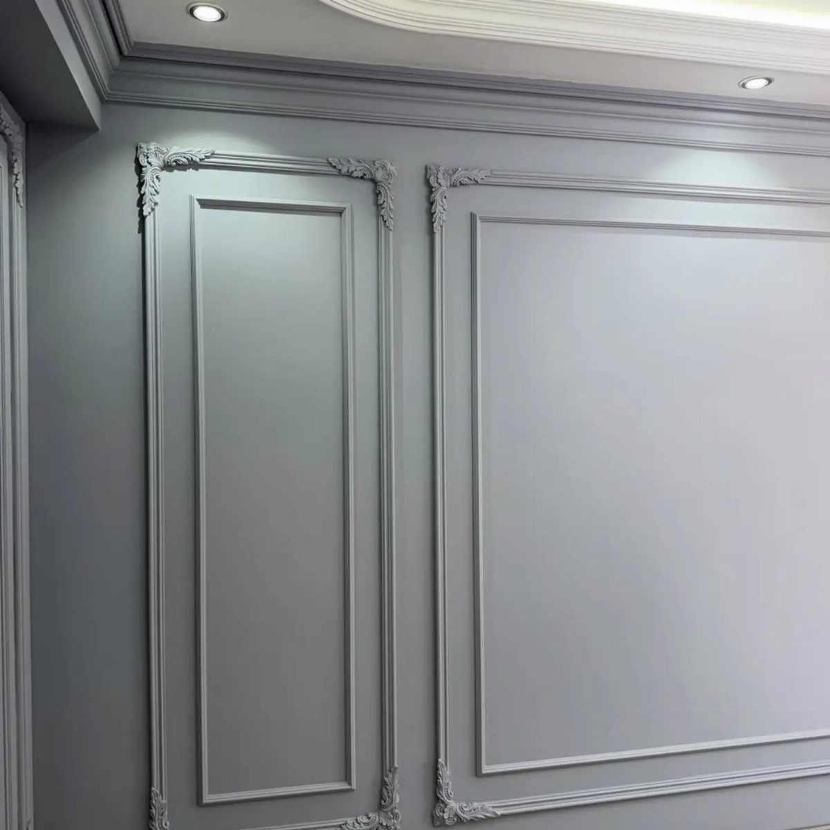 Grey walls decorated with elegant rectangular french wall molding and ornate corner details.